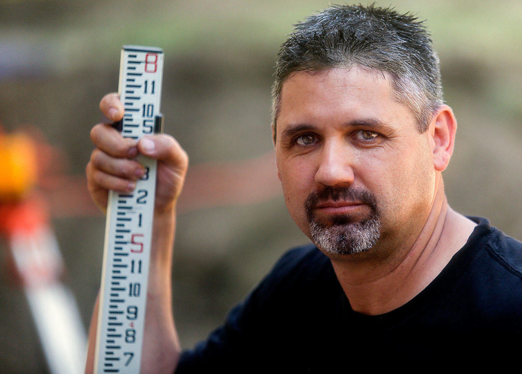 Construction project manager Aaron Tally is renovating a house next to Cedar Springs Camp along Highway 92 betweet Lake Stevens and Granite Falls. It will house kids just coming into foster care, providing “soft-landing” stays of up to 30 days. (Dan Bates / The Herald)
