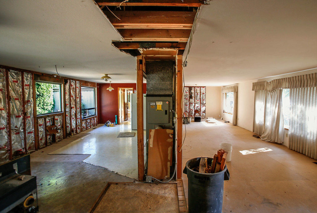 Construction project manager Aaron Tally is renovating a house next to Cedar Springs Camp along Highway 92 between Lake Stevens and Granite Falls. It will serve to house kids just coming into foster care, providing “soft-landing” stays up to 30 days. (Dan Bates / The Herald)
