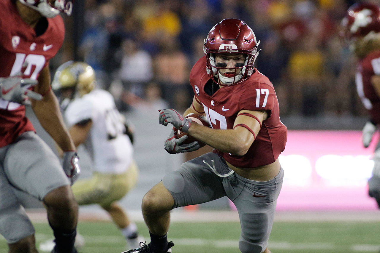Washington State’s Kyle Sweet (17) is part of a wide receiver unit that has a chance to be the deepest in the Pac-12 this season. (AP Photo/Young Kwak)