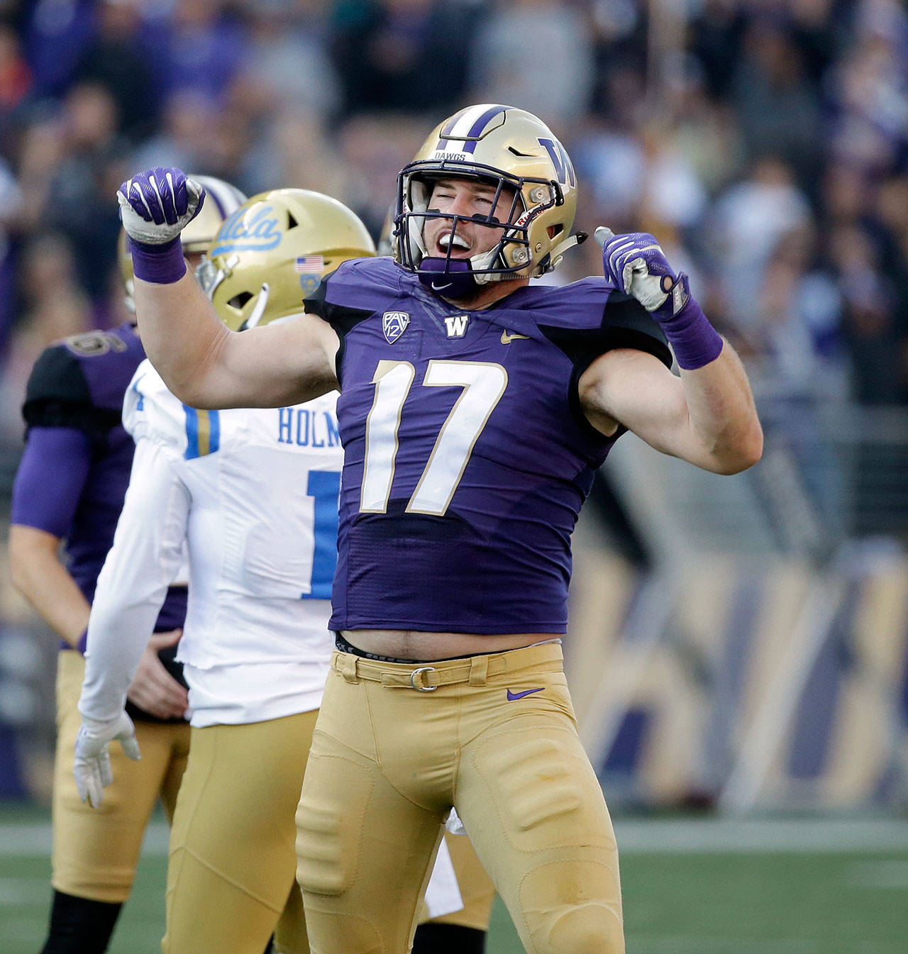 Washington’s Tevis Bartlett reacts to an extra point in a game against UCLA on Oct. 28, 2017, in Seattle. (Elaine Thompson / Associated Press)