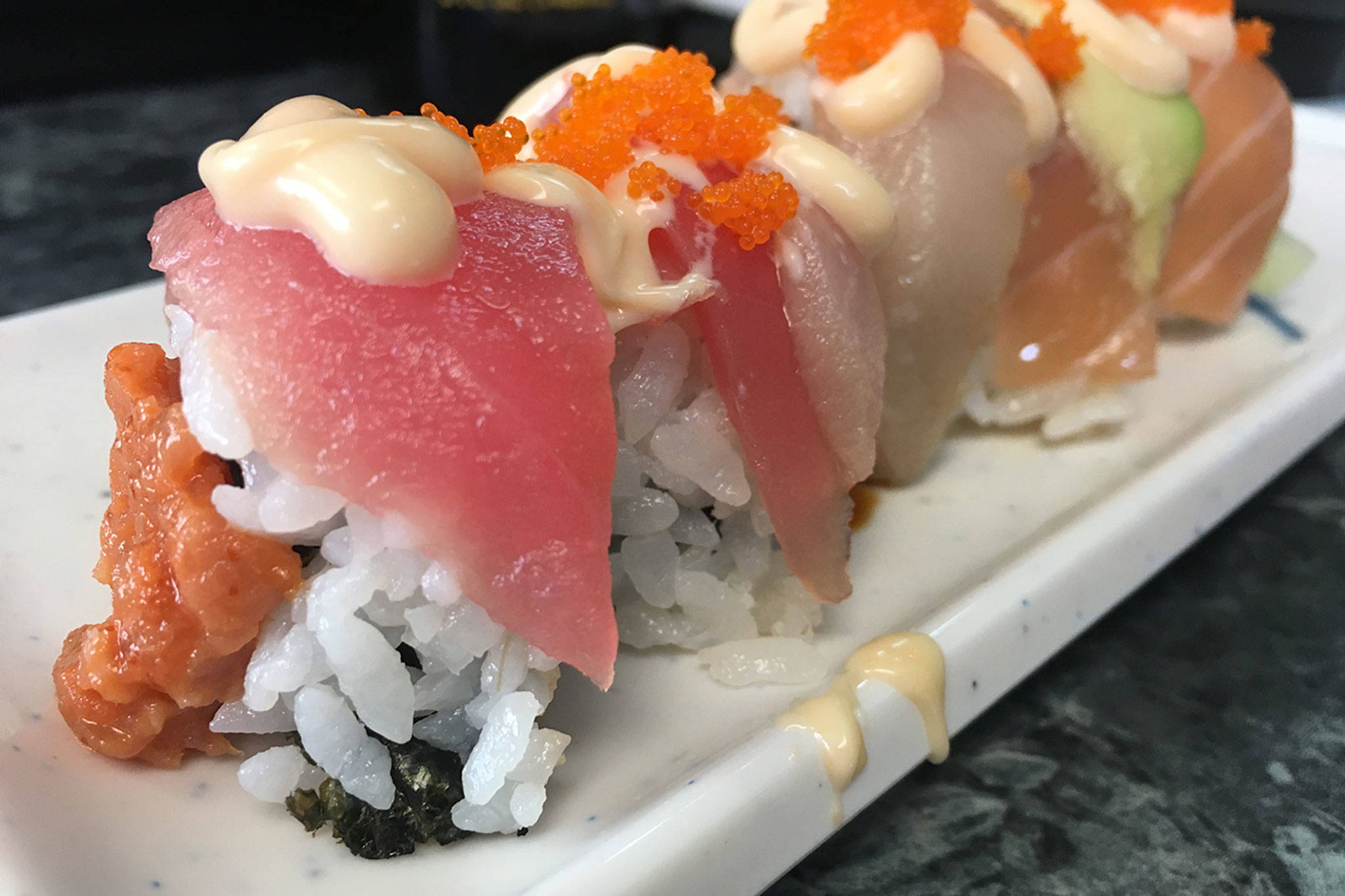 The sex on the beach roll is off-menu and has a little bit of everything on it, making it great as a sampler or a first roll at Sushi Ring. (Ben Watanabe / The Herald)