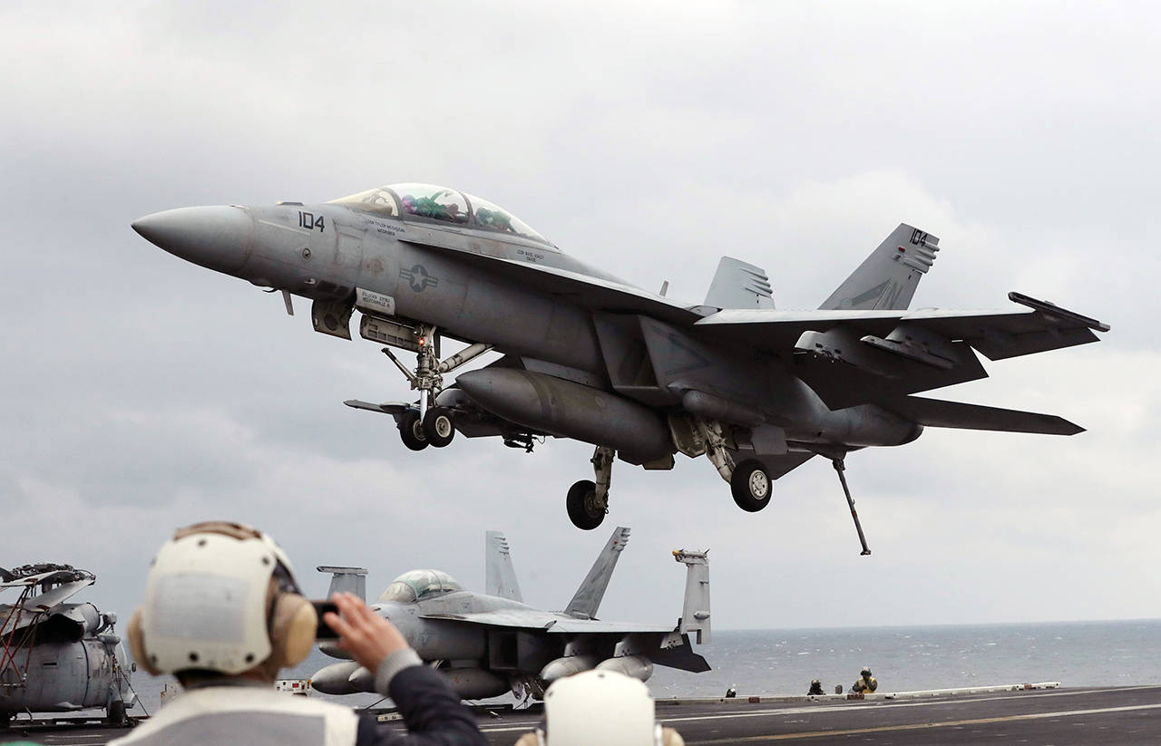 In this 2017 photo, a U.S. Navy’s F/A-18 Super Hornet fighter approaches the deck of the Nimitz-class aircraft carrier USS Carl Vinson during the annual joint military exercise called Foal Eagle between South Korea and the United States at an unidentified location in the international waters, east of the Korean Peninsula. (AP Photo/Lee Jin-man, File)