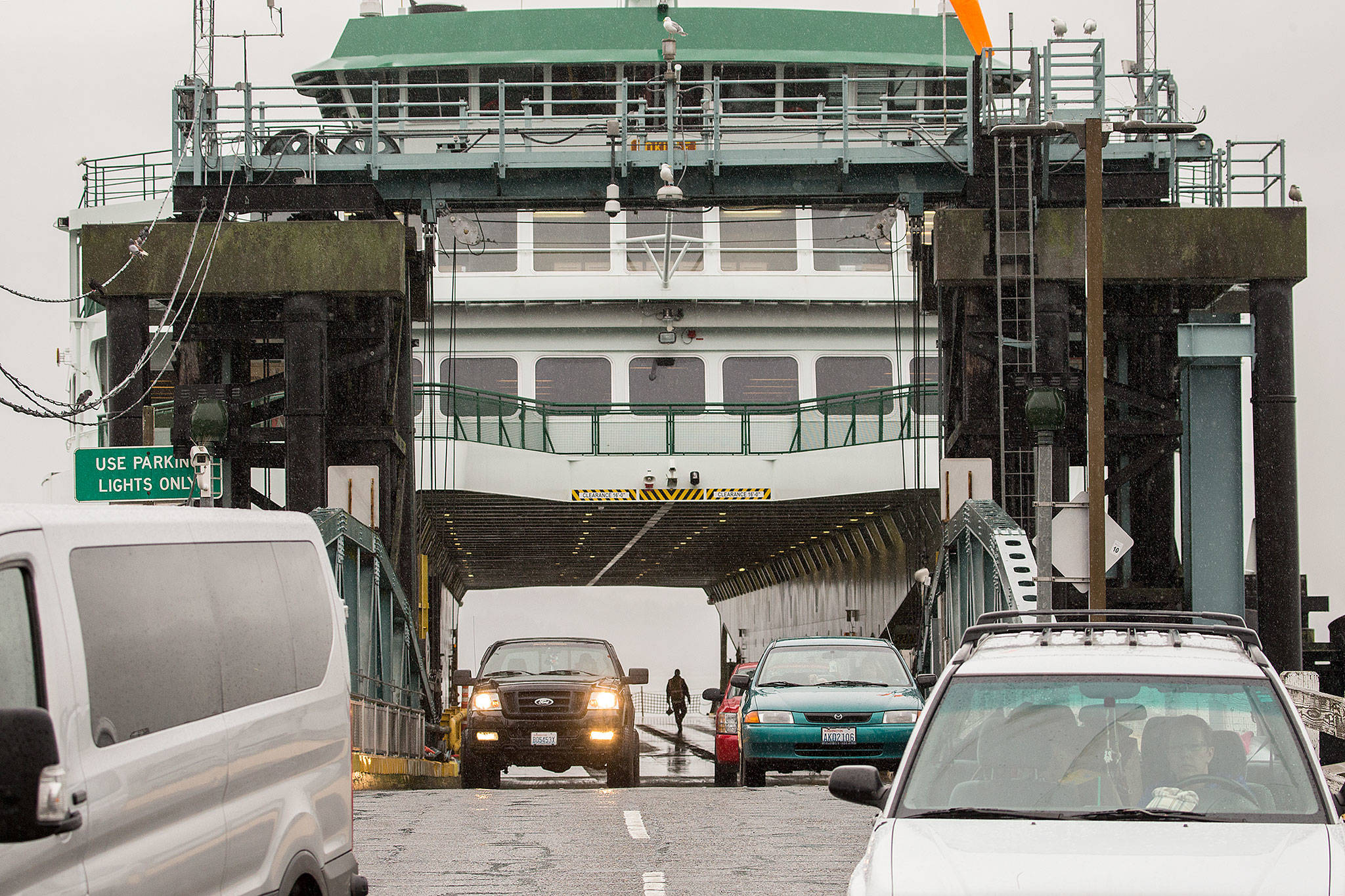 Commuters from Whidbey Island disembark their vehicles from the ferry Tokitae last February in Mukilteo. (Andy Bronson / Herald file)