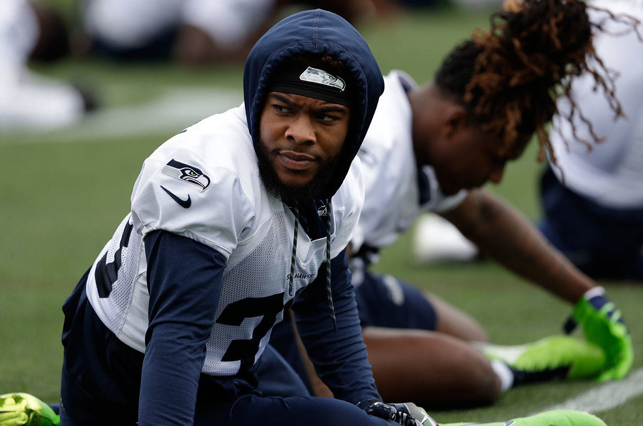 Seahawks safety Tedric Thompson stretches before a practice June 12, 2018, in Renton. (AP Photo/Elaine Thompson)