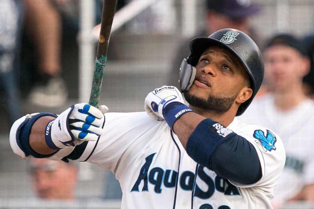 Mariners slugger Robinson Cano, on a rehab assignment with the AquaSox, bats during a game against the Emeralds on Thursday at Everett Memorial Stadium. (Kevin Clark / The Herald)
Mariners slugger Robinson Cano, on a rehab assigment with the AquaSox, bats during a game against the Emeralds on Aug. 9, 2018, at Everett Memorial Stadium. (Kevin Clark / The Herald)
