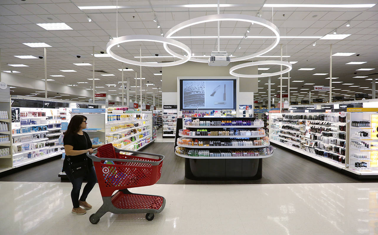 A shopper walks through the updated cosmetic department at a Target store in San Antonio in May. (AP Photo/Eric Gay, File)