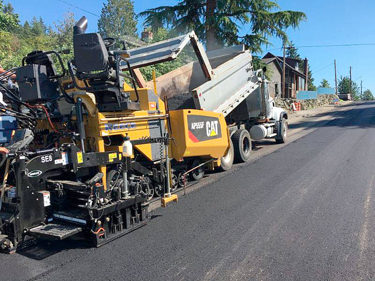Reece Construction workers pave Division Street in Arlington in July. The company enters the home stretch now for the city’s 2018 pavement preservation project. (City of Arlington)