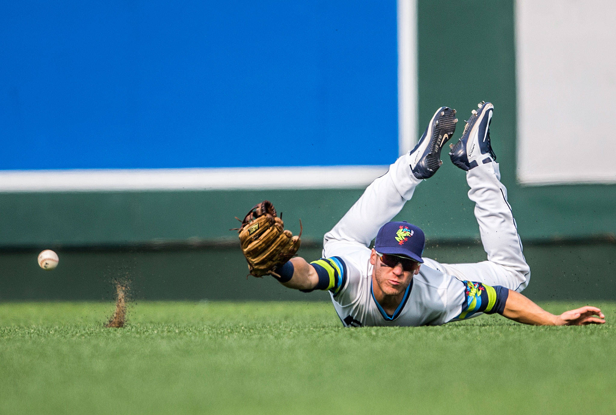 Everett AquaSox’s Ryan Ramiz dives for a catch and misses during the Sunday game against the Eugene Emeralds at Everett Memorial Stadium on Aug. 12, 2018 in Everett, Wa. (Olivia Vanni / The Herald)