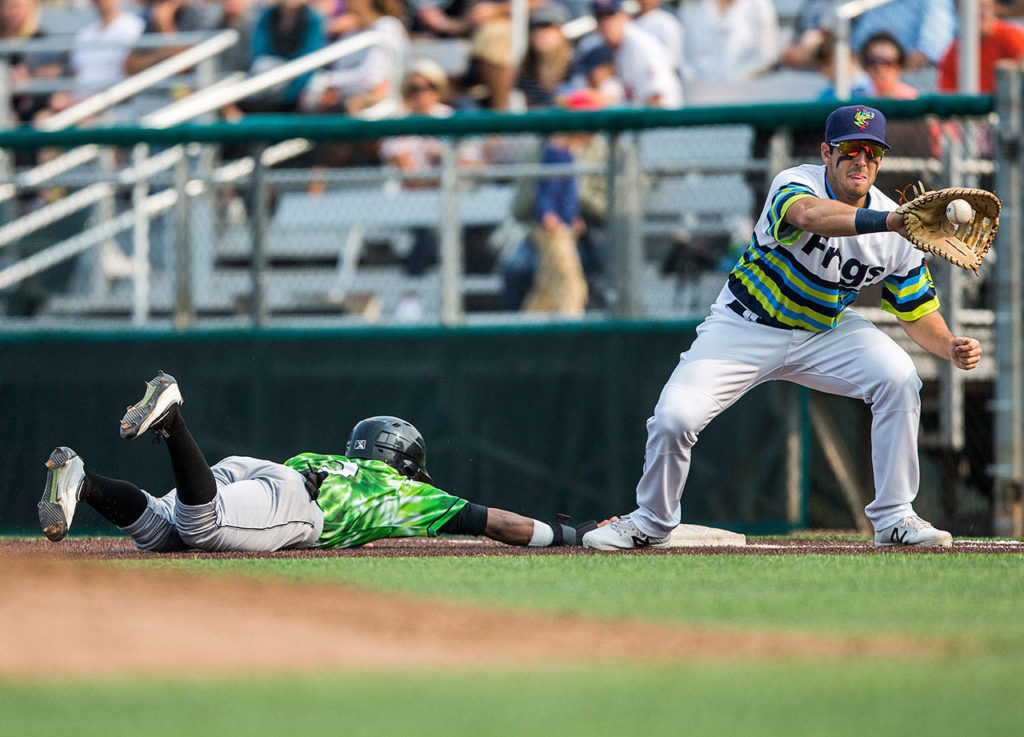Everett AquaSox’s Ryan Garcia catches a throw at first base during the Sunday game against the Eugene Emeralds at Everett Memorial Stadium on Aug. 12, 2018 in Everett, Wa. (Olivia Vanni / The Herald)
