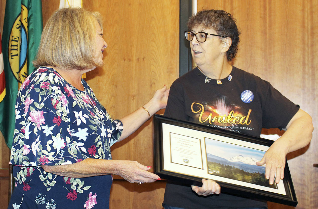 Arlington Mayor Barb Tolbert presents Anna Pritchard with the Mayor’s Volunteer Award on Aug. 6, 2018. (Contributed photo)