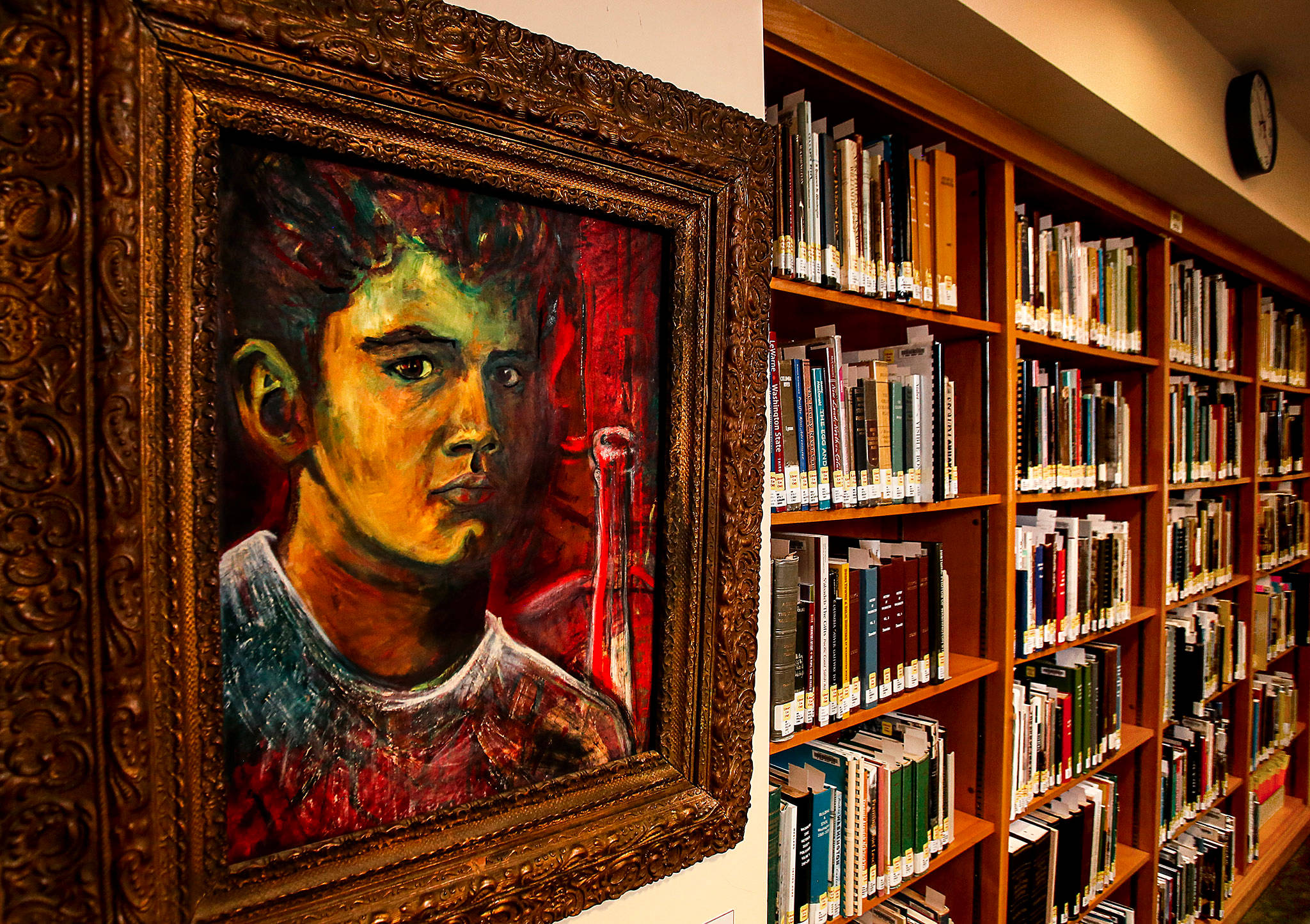 Along with hosting a public event to seal the city’s 125th anniversary time capsule, the Everett Public Library now has a 1961 self-portrait of David Dilgard on display in its Northwest Room. The highly respected historian, who died in May, worked in the library from 1977 to 2017. (Dan Bates / The Herald)