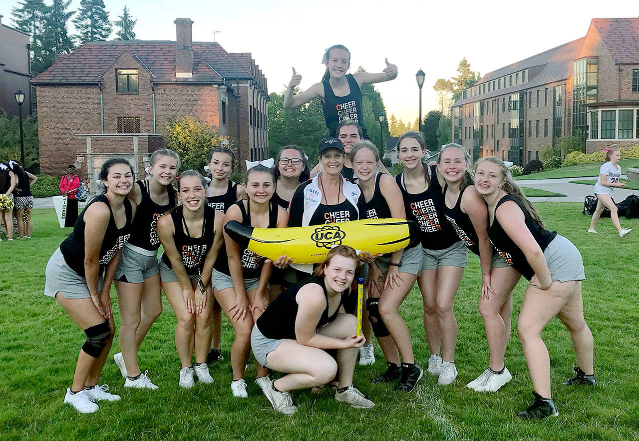 Granite Falls High School enjoyed a day as Top Banana at a recent cheer camp, and at the end of the camp came home with four trophies. (Contributed photo)