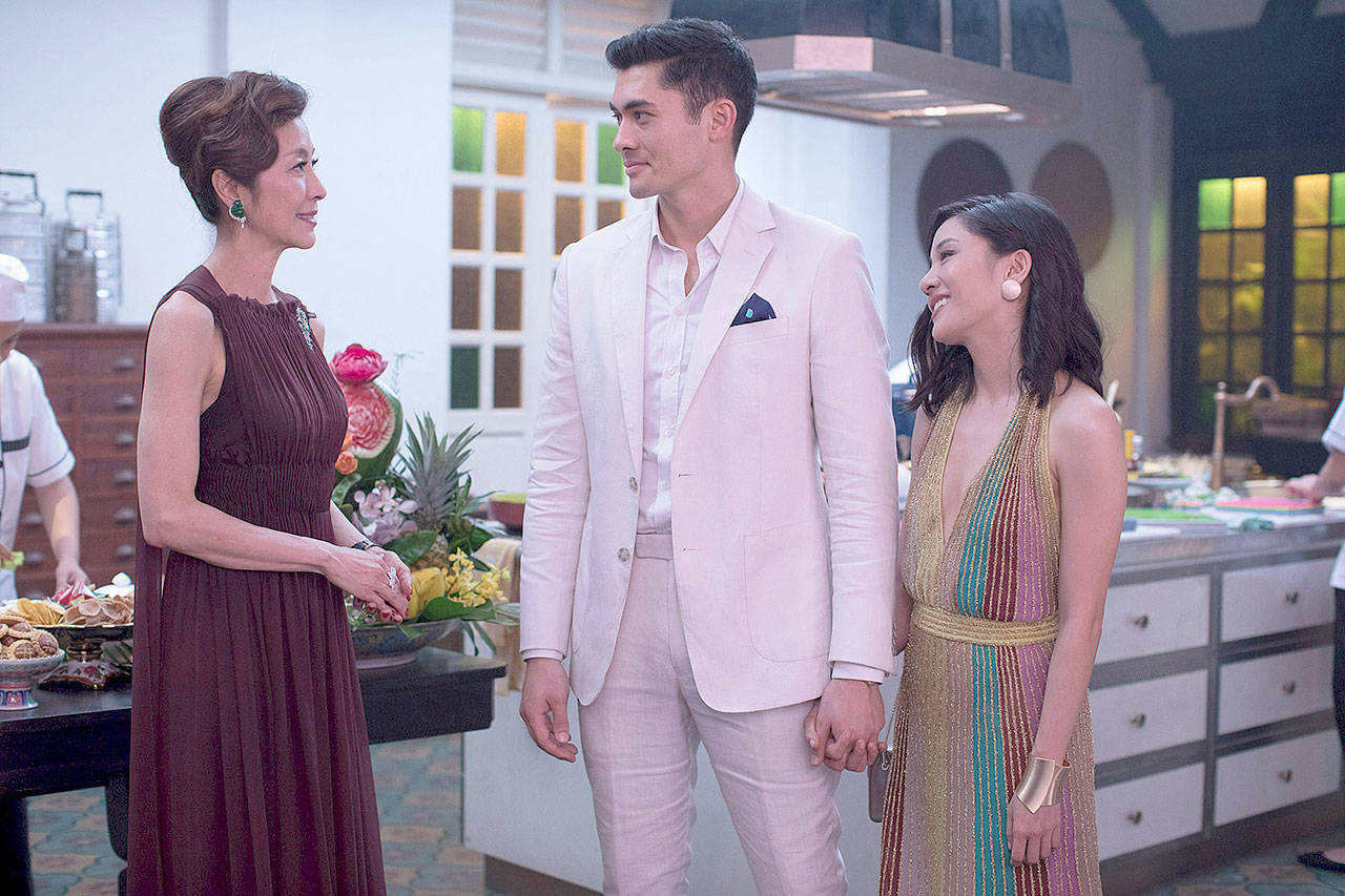 Warner Bros. Pictures                                From left, Michelle Yeoh, Henry Golding and Constance Wu star in “Crazy Rich Asians.”