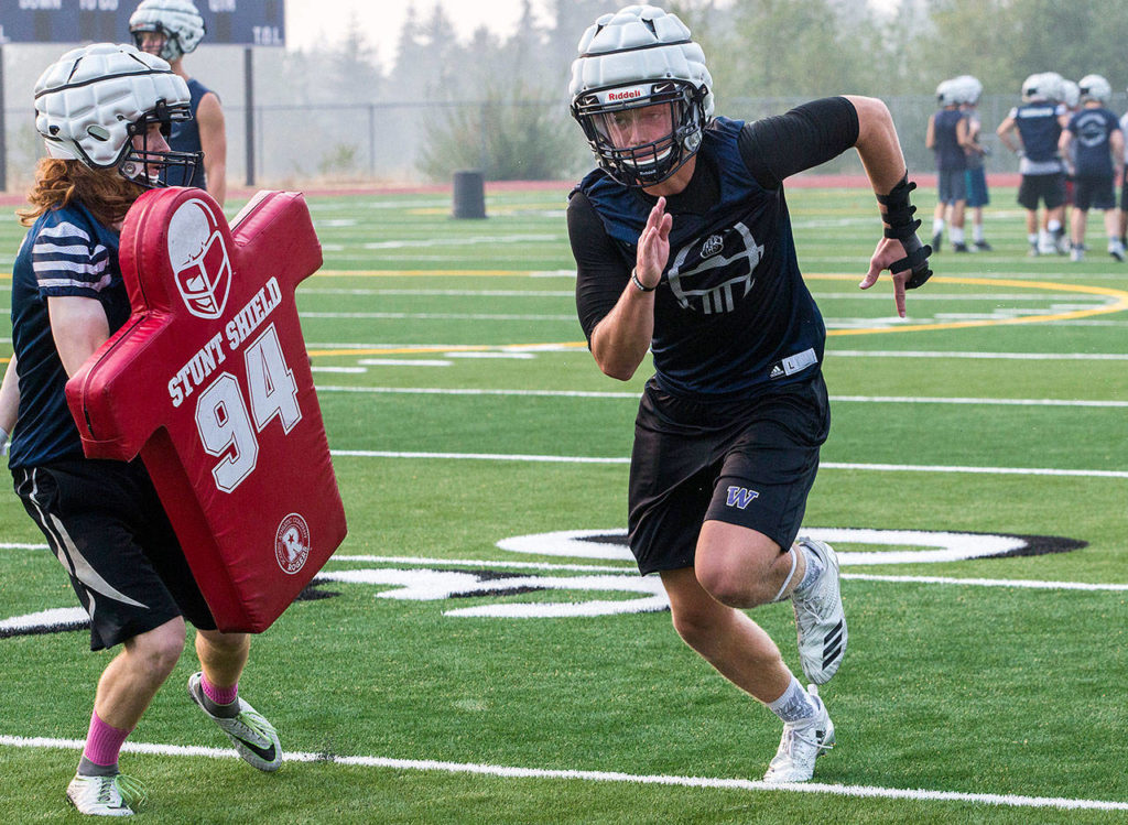 Glacier Peak’s wide receiver Evan Mannes runs through a drill during football practice at Glacier Peak High School on Aug. 15, 2018 in Snohomish, Wa. (Olivia Vanni / The Herald)
