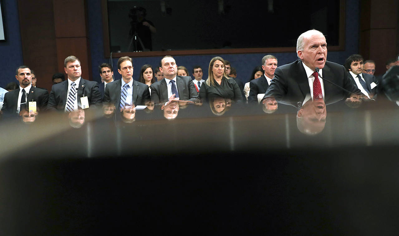 Former CIA Director John Brennan (right) testifies on Capitol Hill in Washington in 2017 before the House Intelligence Committee Russia Investigation Task Force. (AP Photo/Pablo Martinez Monsivais)