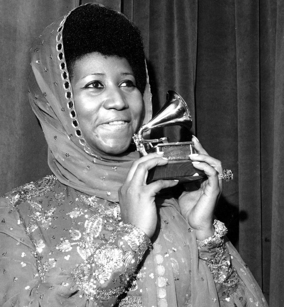 In this 1975 photo, singer Aretha Franklin poses with her Grammy Award for for best female R&B vocal performance for “Ain’t Nothing Like the Real Thing” at the 17th Annual Grammy Award presentation in New York. (AP Photo, File)
