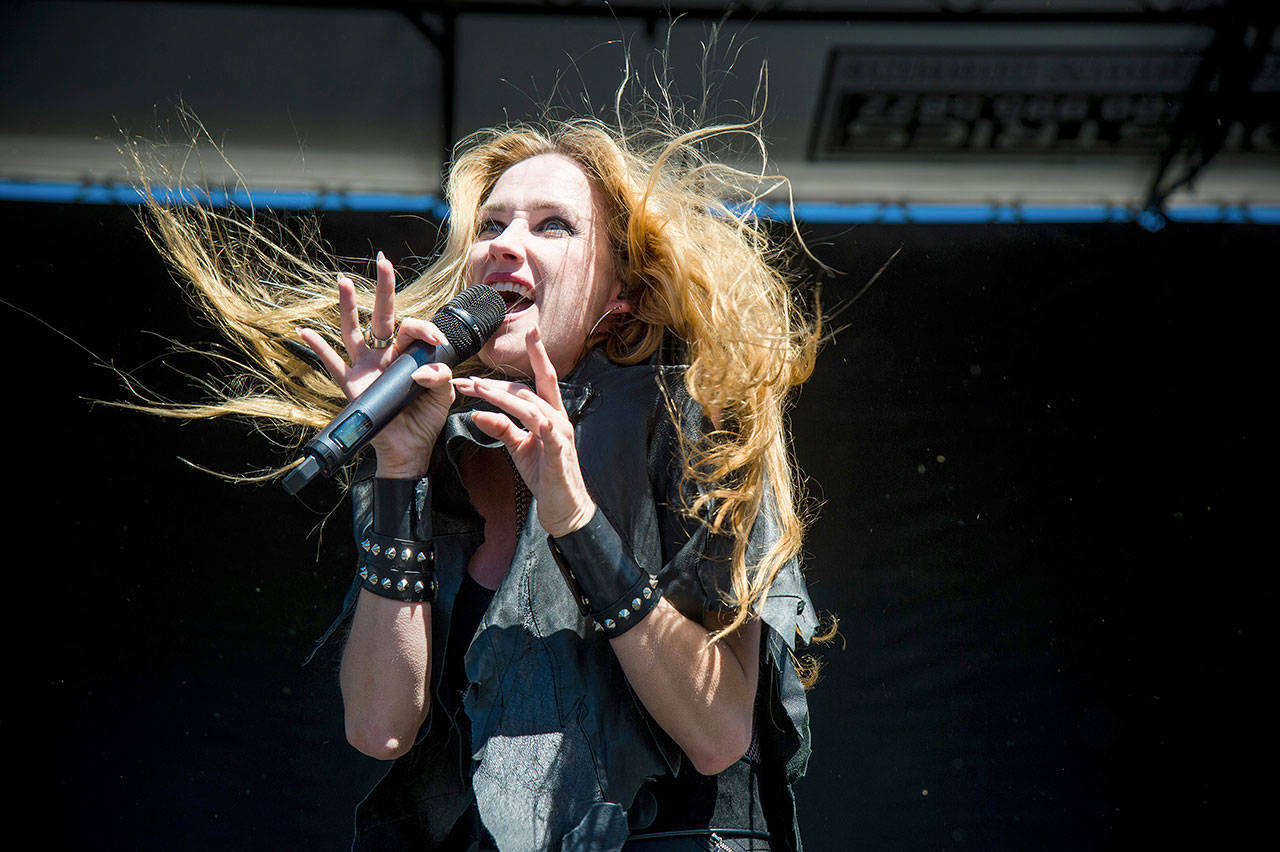 Jill Janus of Huntress performs at Ozzfest 2016 at San Manuel Amphitheater in San Bernardino, California. Janus, lead singer of the heavy metal band Huntress, has died at age 43. (Amy Harris / Invision file)