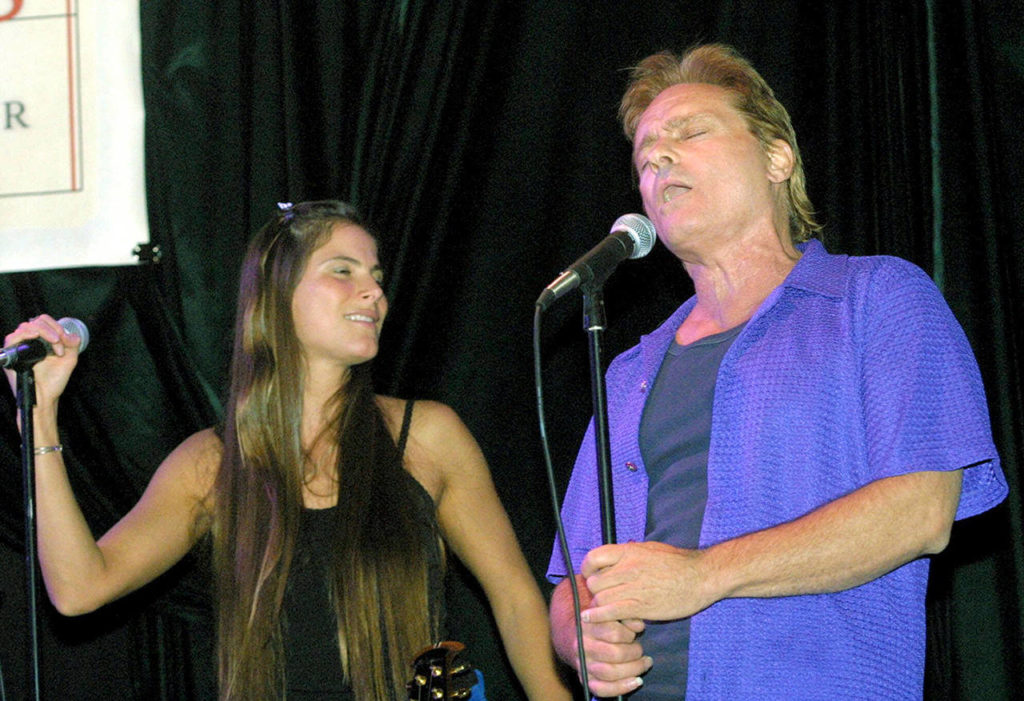 Jefferson Starships’ Marty Balin (right) performs alongside Diana Mangano during the ‘Freedom Sings’ benefit concert sponsored by the First Amendment Center in New York on June 20, 2001. (AP Photo/Shawn Baldwin, file)

