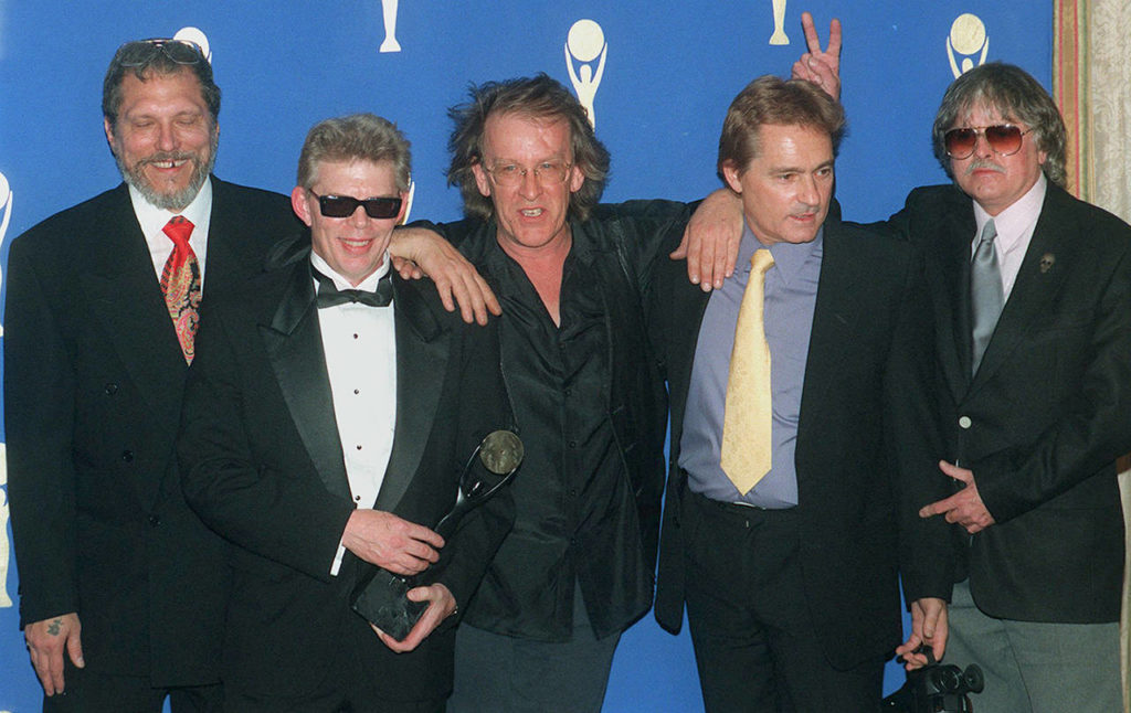 Members of “The Jefferson Airplane” (from left) Jorma Kaukonen, Jack Casady, Paul Kantner, Marty Balin and Spencer Dryden pose backstage after the band’s induction into the Rock and Roll Hall of Fame in New York’s Waldorf-Astoria Hotel on Jan. 17, 1996. (AP Photo/Joe Tabacca, file)
