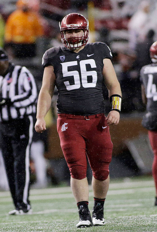 Taylor Comfort, a graduate of Sultan High School, is in the running to start on WSU’s defensive line this season. (AP Photo/Young Kwak)