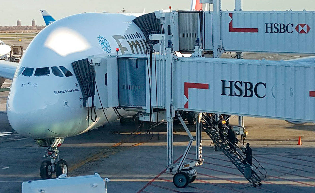 An Emirates Airbus A380 at a gate at Kennedy International Airport in New York. (Tom Peterson / Washington Post)