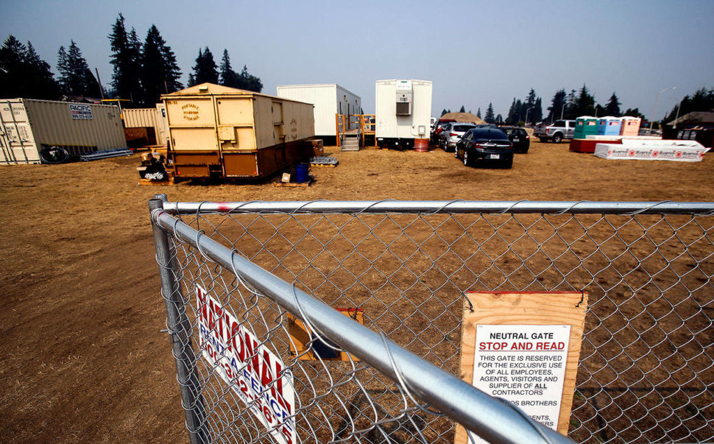 Portable construction facilities sit in the area that will become a new park in Everett’s Glacier View neighborhood. (Dan Bates / The Herald)
