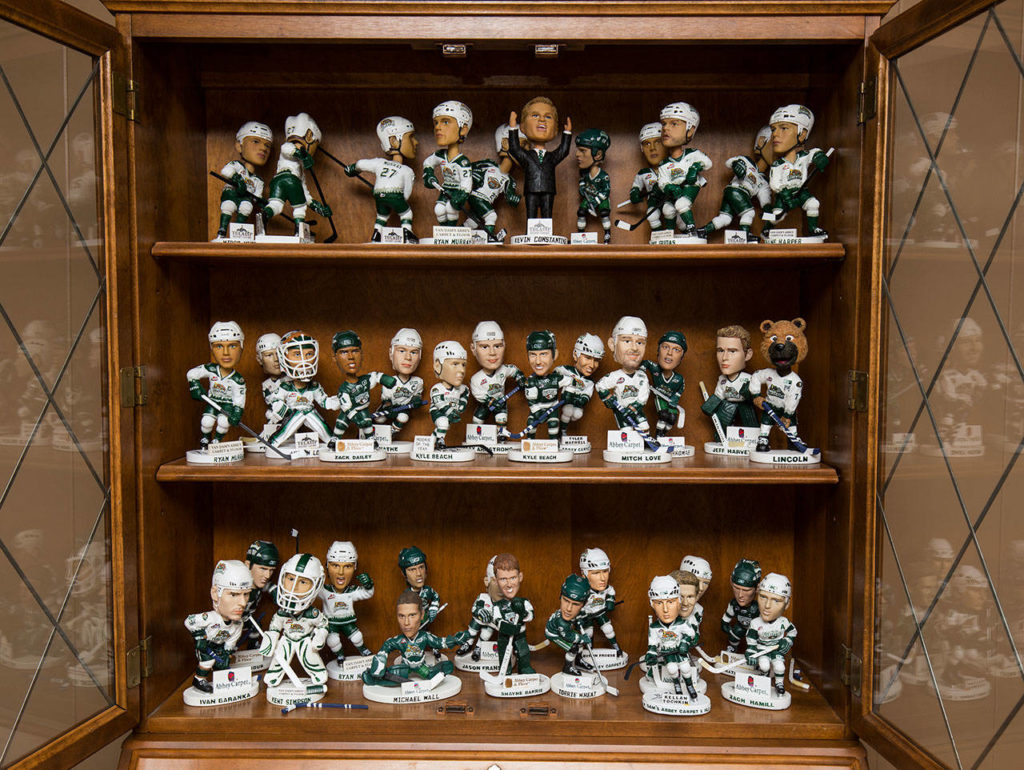 The complete Everett Silvertips bobblehead collection sits in a case at the Mukilteo home of Parker Fowlds who has been a Silvertips billet since the franchise began in 2003. (Andy Bronson / The Herald)
