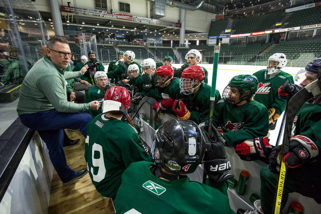 Silvertips coach Dave Williams talks with players during a break on the first day of training camp on Aug. 23, 2018, at Angel of the Winds Arena in Everett. (Andy Bronson / The Herald)
