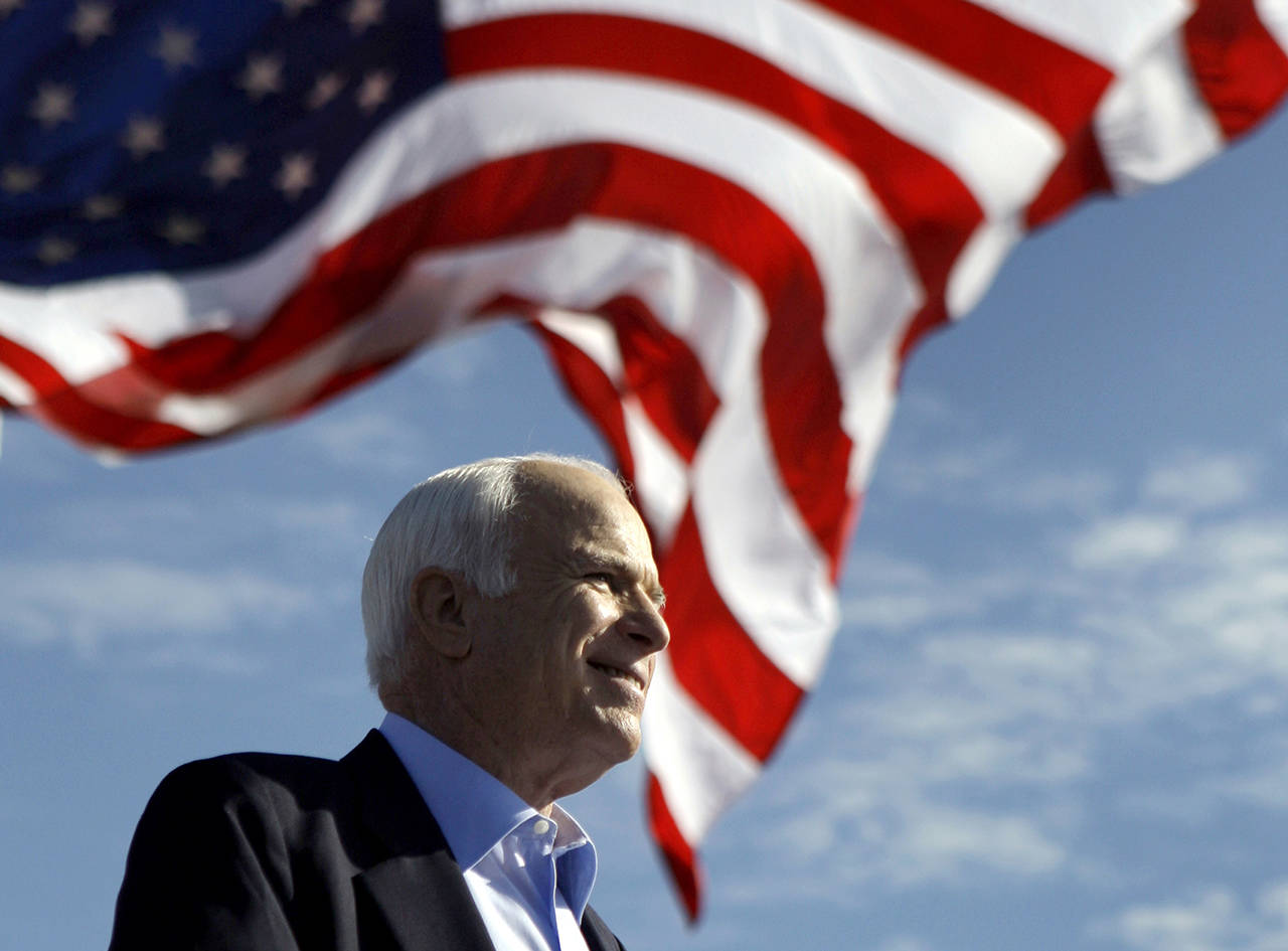 In this Nov. 3, 2008 photo, Republican presidential candidate Sen. John McCainspeaks at a rally outside Raymond James Stadium in Tampa, Florida. (AP Photo/Carolyn Kaster))