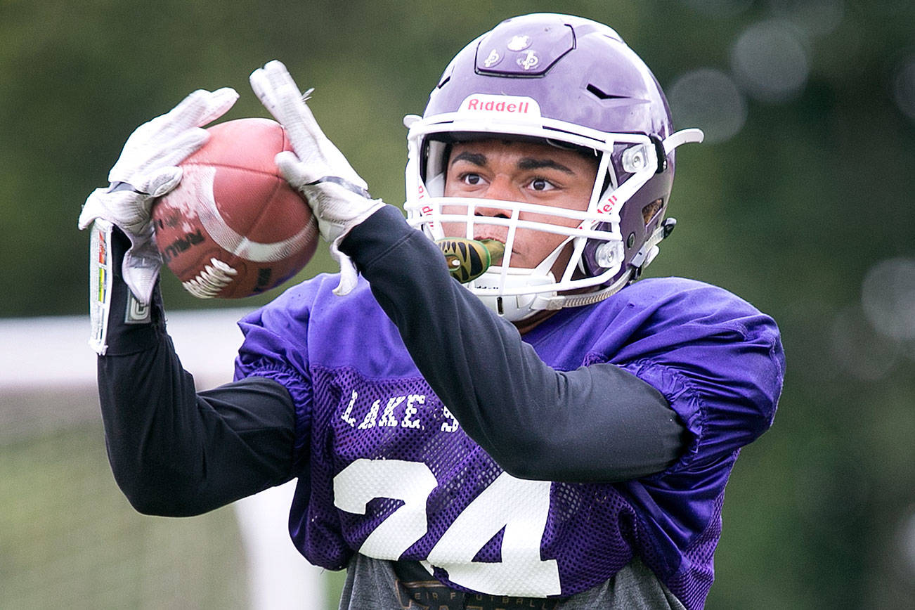 Kasen Kinchen makes a catch Thursday afternoon during practice at Lake Stevens High School in Lake Stevens on August 23, 2018. (Kevin Clark / The Herald)
