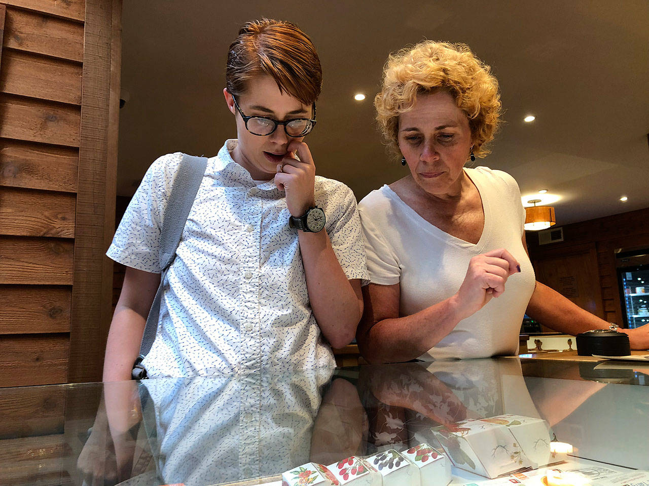Gillian Flaccus / Associated Press                                Cindy Paul, 55, and her daughter, Doc Paul, 31, both of Billings, Montana, shop for marijuana edibles at a marijuana retail store in downtown Portland, Oregon. Cindy Paul has not used marijuana in 25 years but is trying it again now that it’s legal in Oregon. Paul, a client manager at an insurance firm, says the “stoner” stereotype that once surrounded marijuana users is no longer relevant and she considers using the drug similar to having a beer to relax.