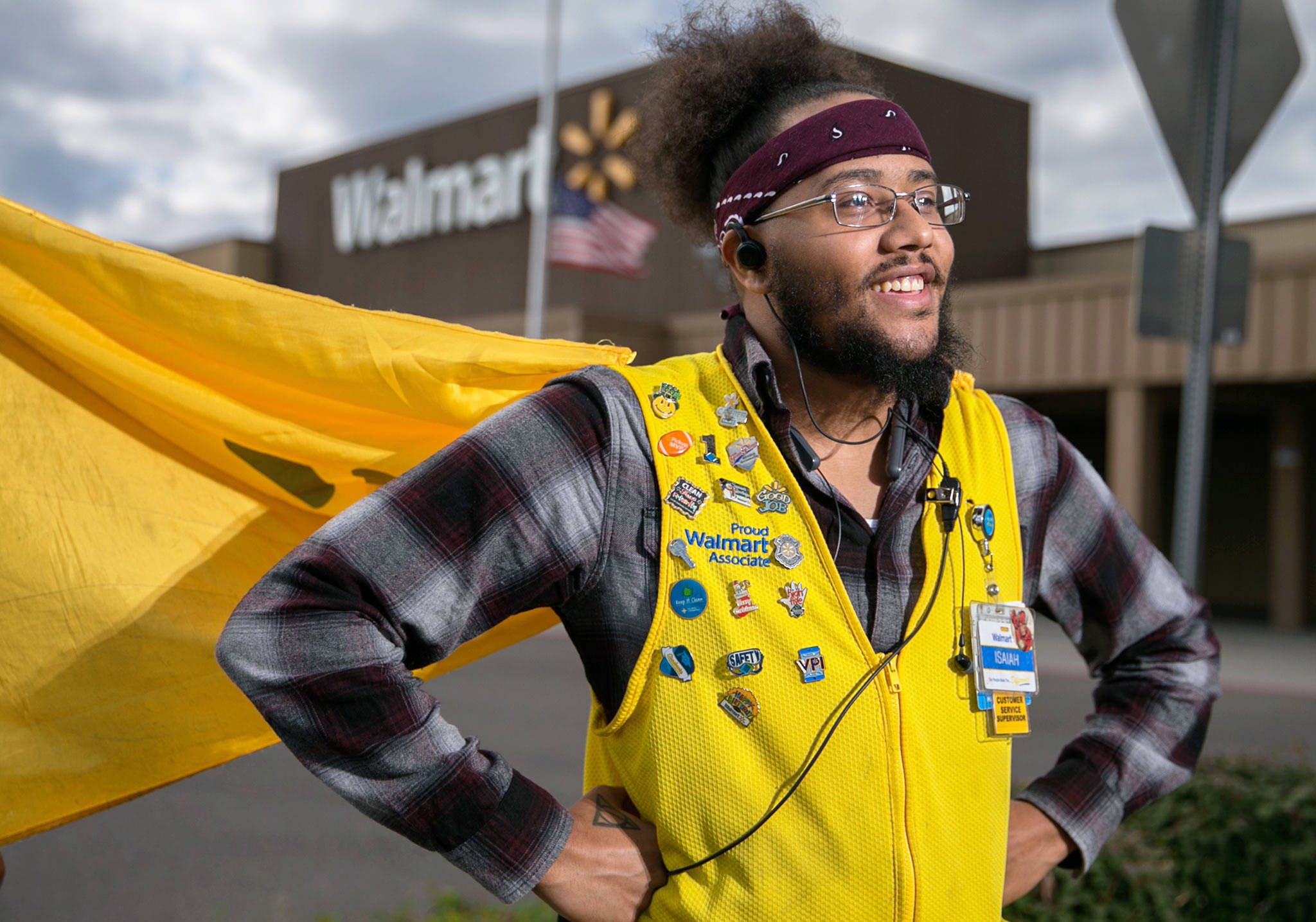 Isaiah Owens, a four-year employee of Walmart, wore a cape as part of a back-to-school season promotion a year ago and never took it off. (Kevin Clark / The Herald)