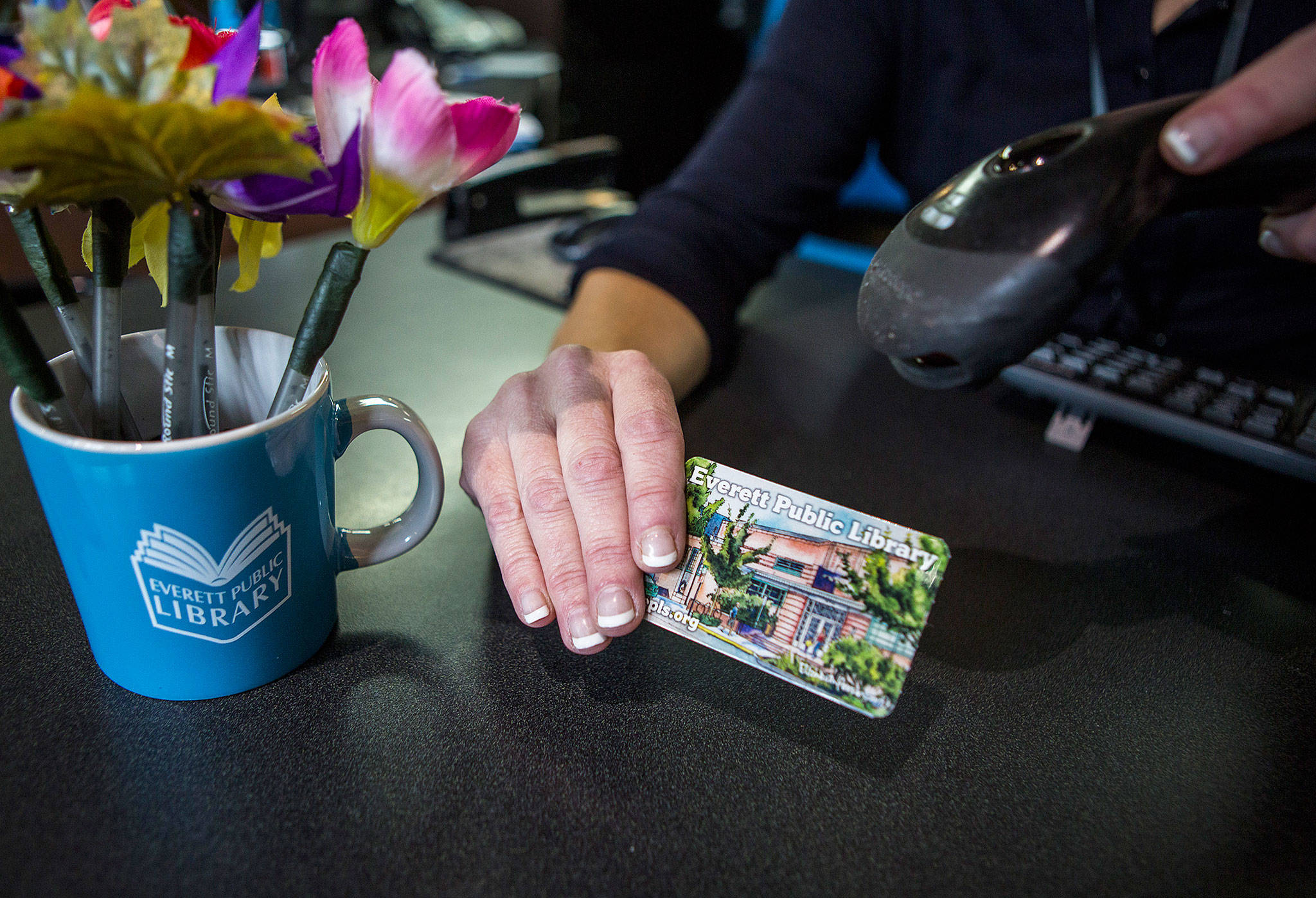 An Elizabeth Person drawing of the Everett Public Library is one of a handful of library card options. (Olivia Vanni / The Herald)