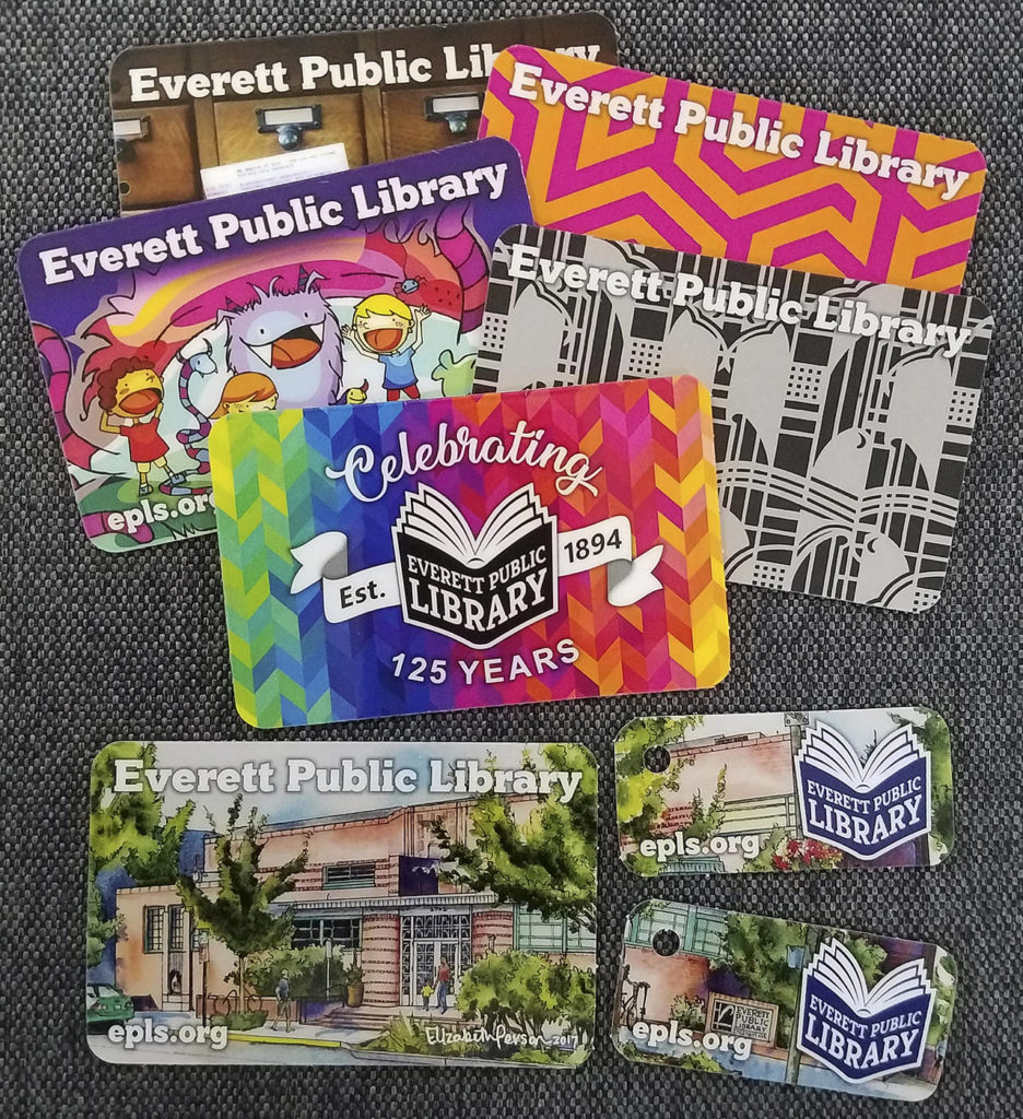 Everett Library’s new designs on library cards include a reproduction design by artist Elizabeth Person. People can choose the design on the card, which includes a smaller keychain card. (Everett Library)
