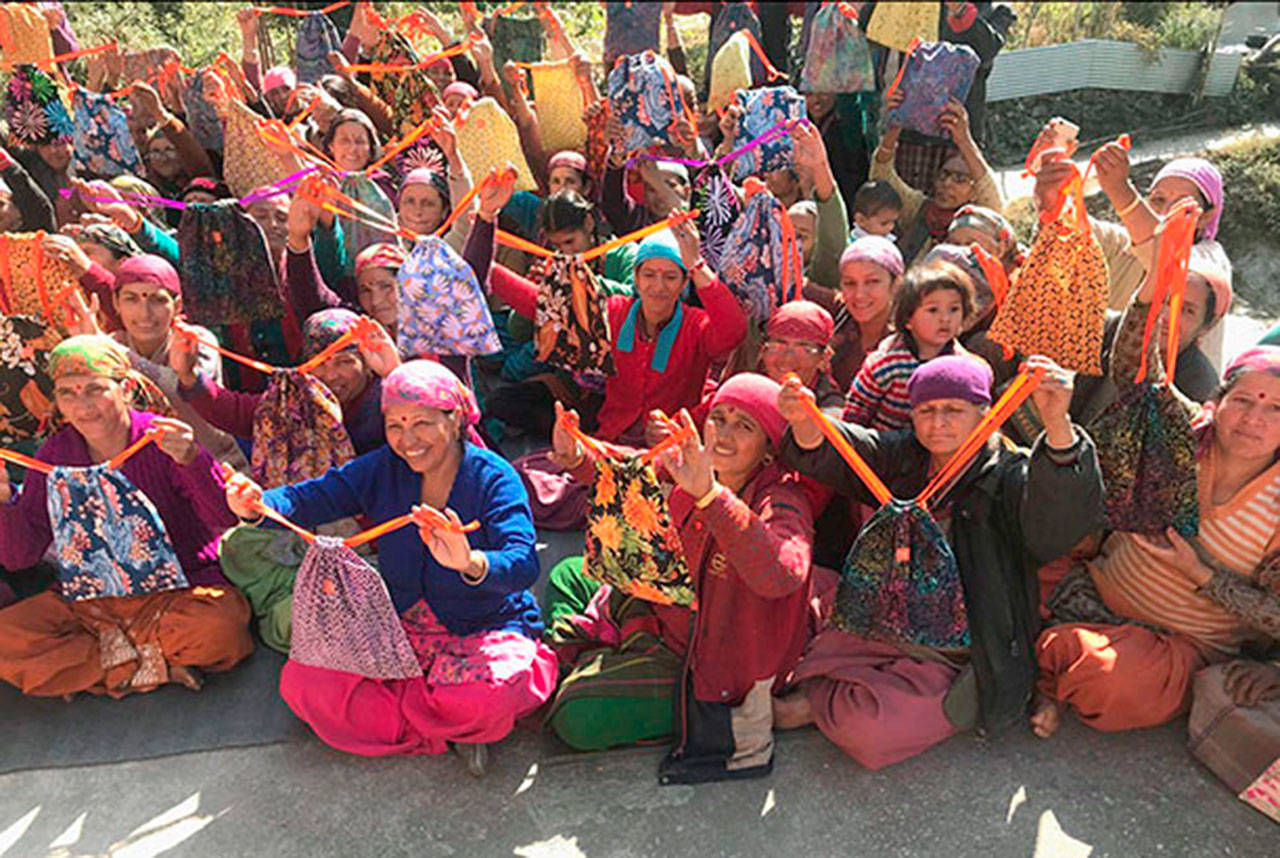 Women in Nepal show off their Days for Girls kits. (Contributed photo)