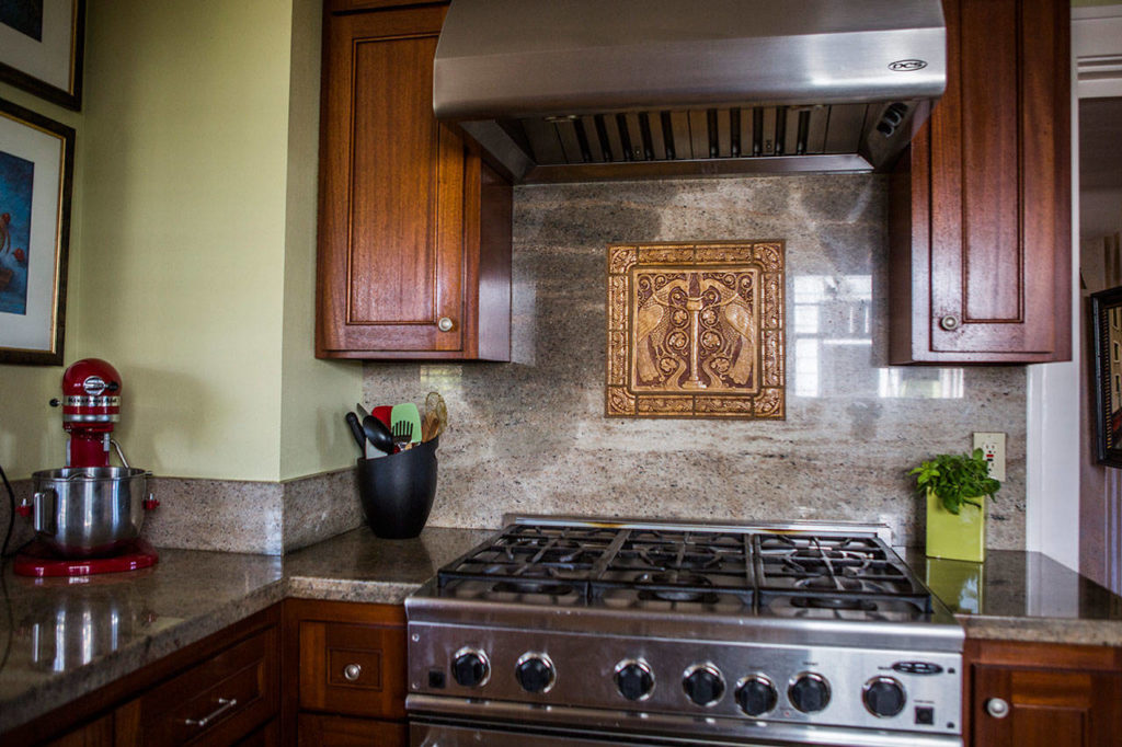 A Batchelder tile replica backslash in the newly renovated kitchen at Marlies Egberding and Ritch Sorgen’s home on Sept. 5 in Everett. (Olivia Vanni / The Herald)
