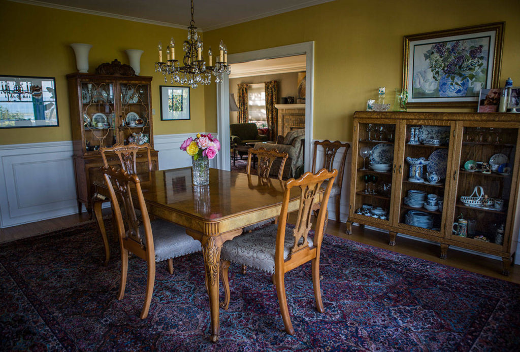 There is a large dining area at Marlies Egberding and Ritch Sorgen’s home in Everett. (Olivia Vanni / The Herald)
