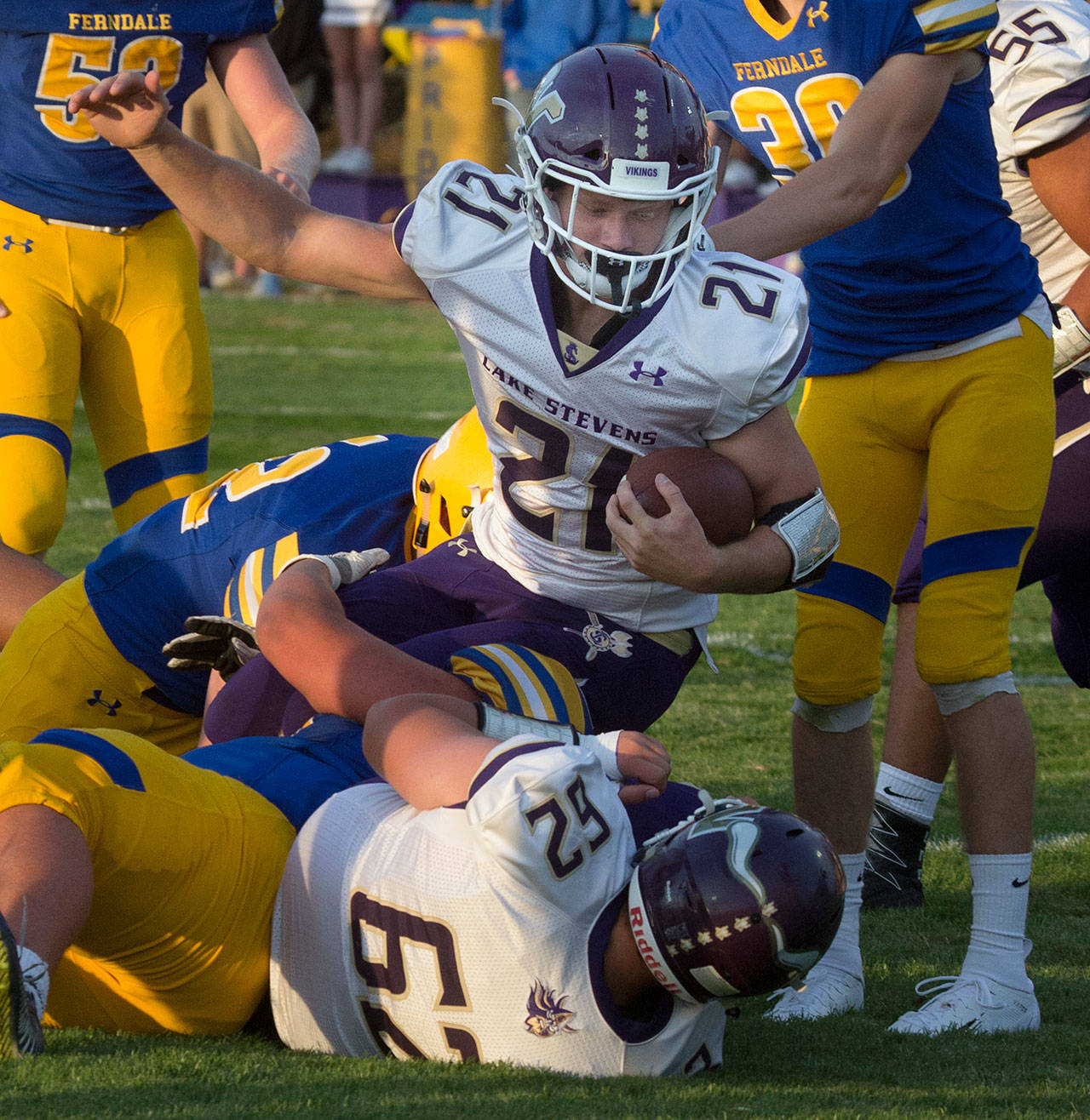 Jackson Grafe (21) and his Lake Stevens teammates play host to Lincoln, the third-ranked Class 3A team in state, Friday night. (Andy Bronson / The Herald)