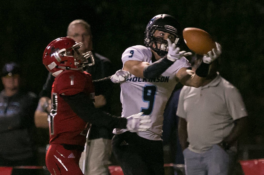Hockinson’s Peyton Brammer (right) makes a touchdown reception with Archbishop Murphy’s Matthew Mavis defending during a game on Sept. 6, 2018, at Archbishop Murphy High School in Everett. (Kevin Clark / The Herald)
