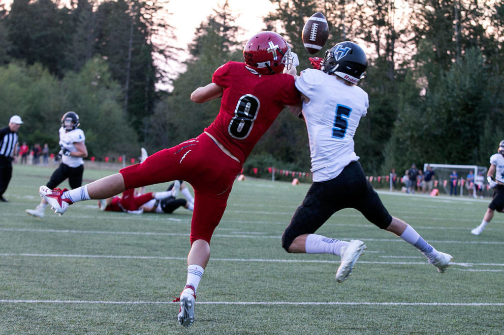 Hockinson’s Wyatt Jones (right) breaks up a pass intended for Archbishop Murphy’s Josh McCarron during a game on Sept. 6, 2018, at Archbishop Murphy High School in Everett. (Kevin Clark / The Herald)
