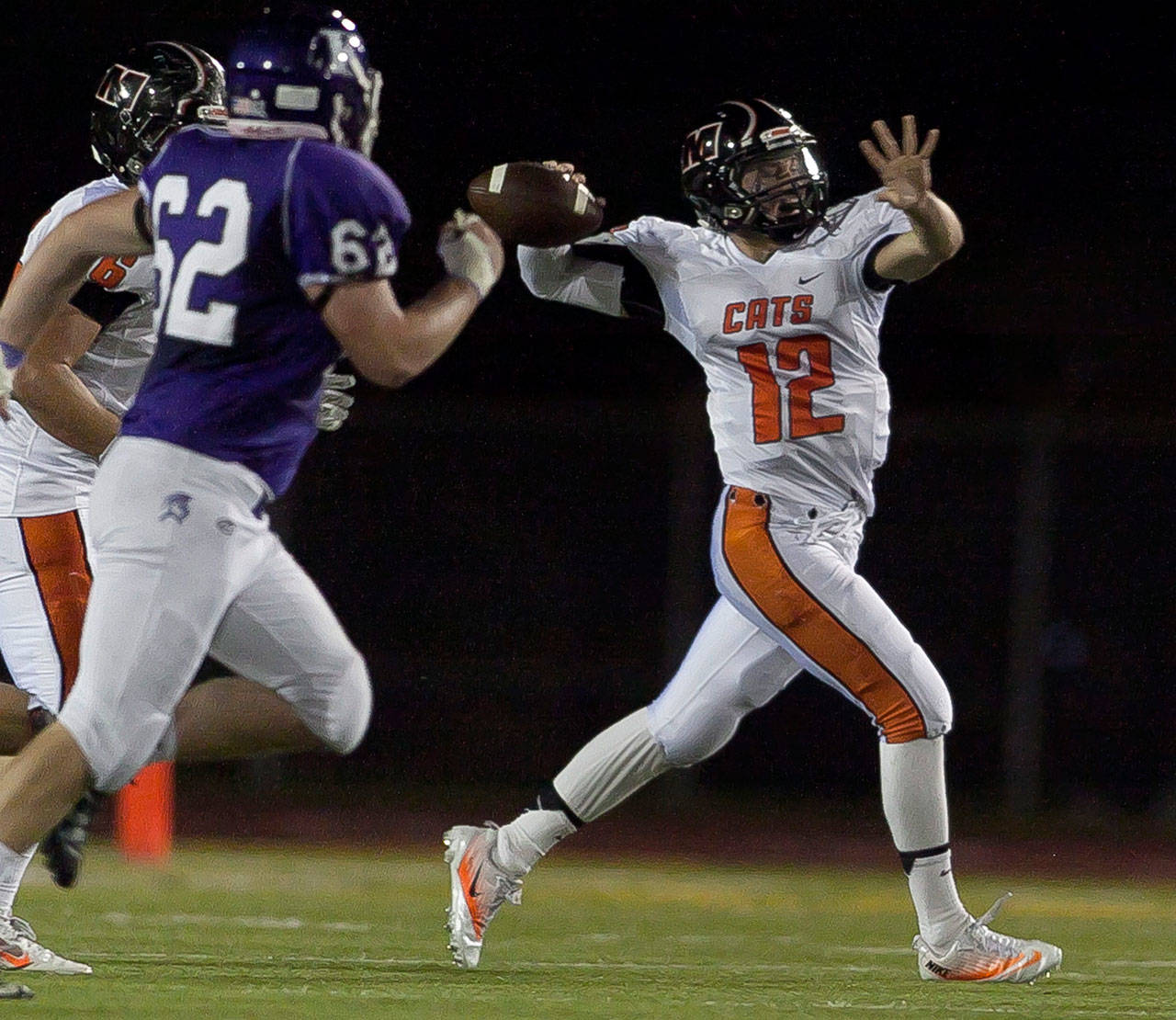 Monroe’s Andrew Zimmerman attempts a pass during a game against Kamiak in 2014. Zimmerman is now a backup quarterback at North Dakota. (Kevin Clark / The Herald)