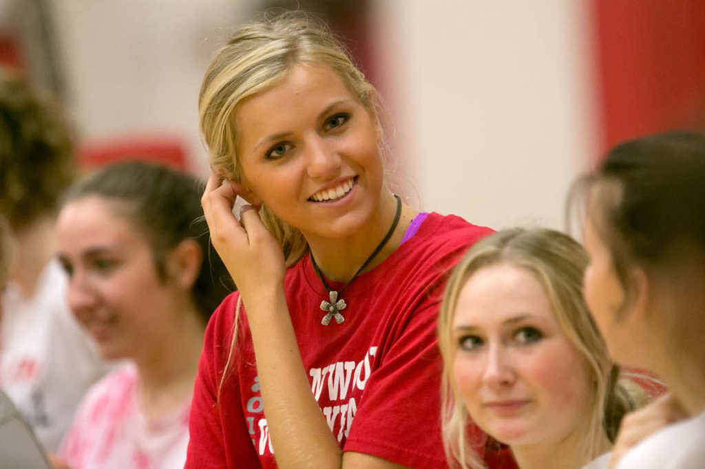 Stanwood senior Devon Martinka smiles during practice on Sept. 12, 2018, at Stanwood High School. (Kevin Clark / The Herald)
