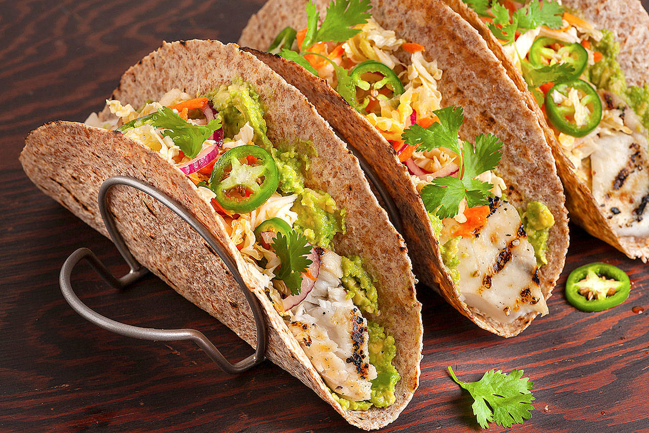 (Photo for The Washington Post by Goran Kosanovic)                                Don’t wait until Taco Tuesday to make fish tacos with Asian slaw — they’re good any day of the week.