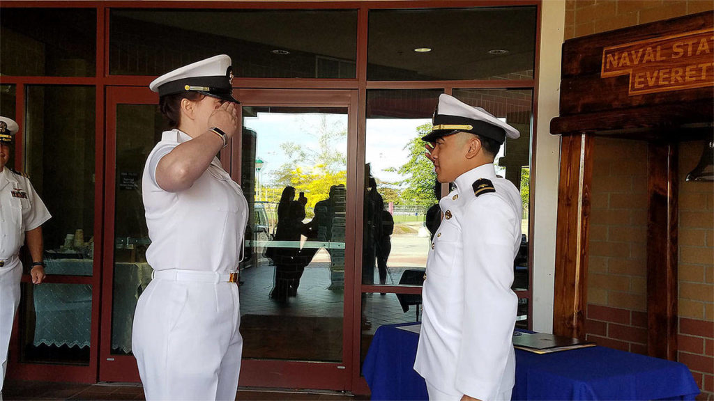 Leighton Flores, of Marysville, gives his first salute to his former Marysville Navy Junior ROTC naval science instructor Chief Kathy Wilde at a ceremony held Sept. 9 at Naval Station Everett. (Contributed photo)
