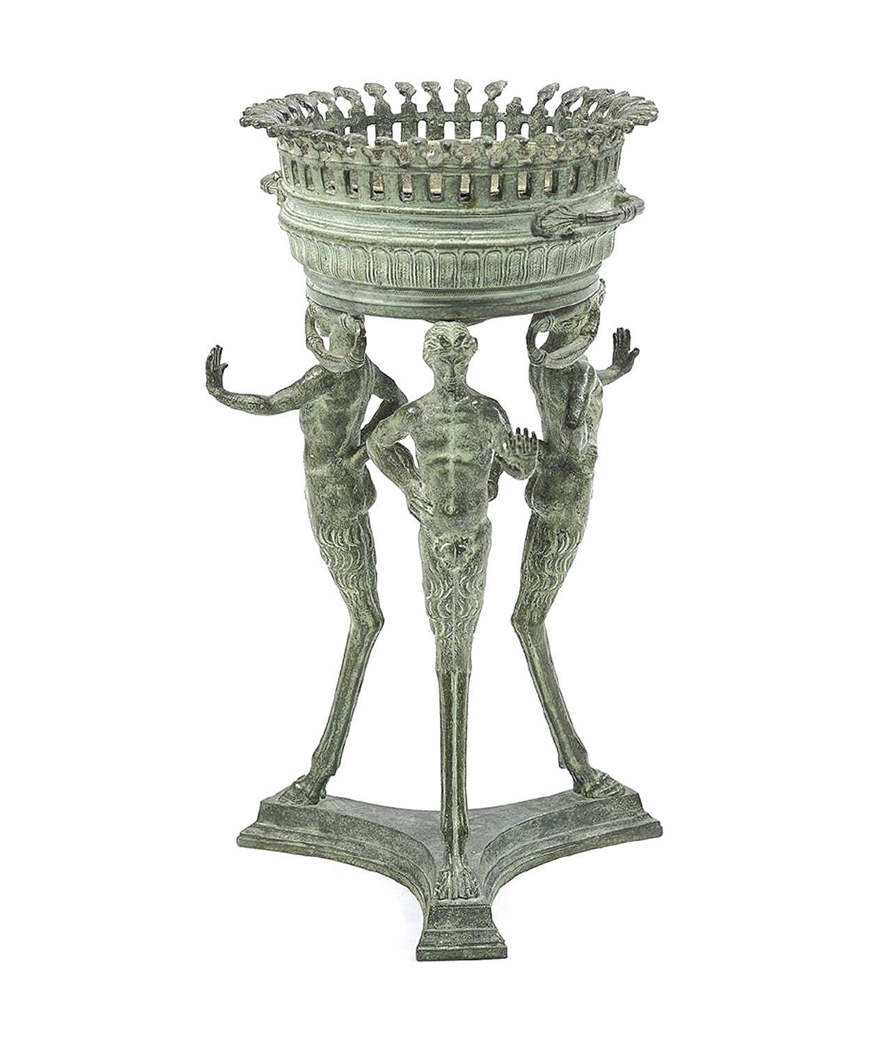 Three men with animal feet hold this Roman brazier on their heads. It is a copy of an excavated piece from Pompeii that was buried in 78 A.D. Many pictures and artifacts showed life in the town, a place for entertainment and erotica. (Cowles Syndicate Inc.)