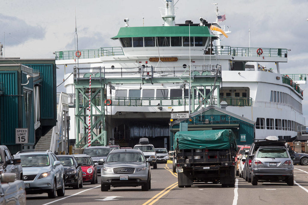 The MV Puyallup. a ferry capable of carrying 202 cars, offloads at the Edmonds Ferry dock on Friday, Sept. 21, 2018 in Edmonds, Wa. (Andy Bronson / The Herald)
