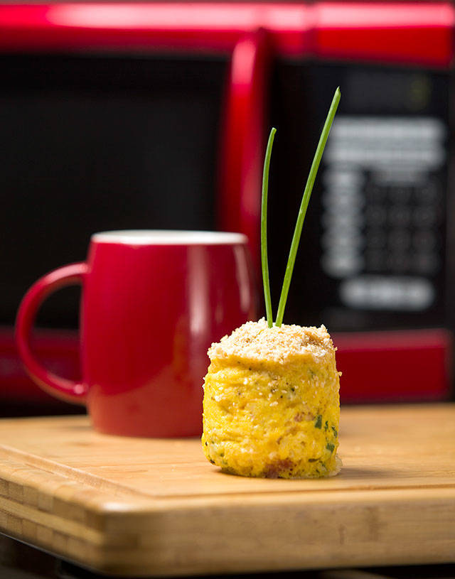 Coffee-cup quiche can be properly plated — or eaten straight from the mug it was cooked in. (Andy Bronson / The Herald)