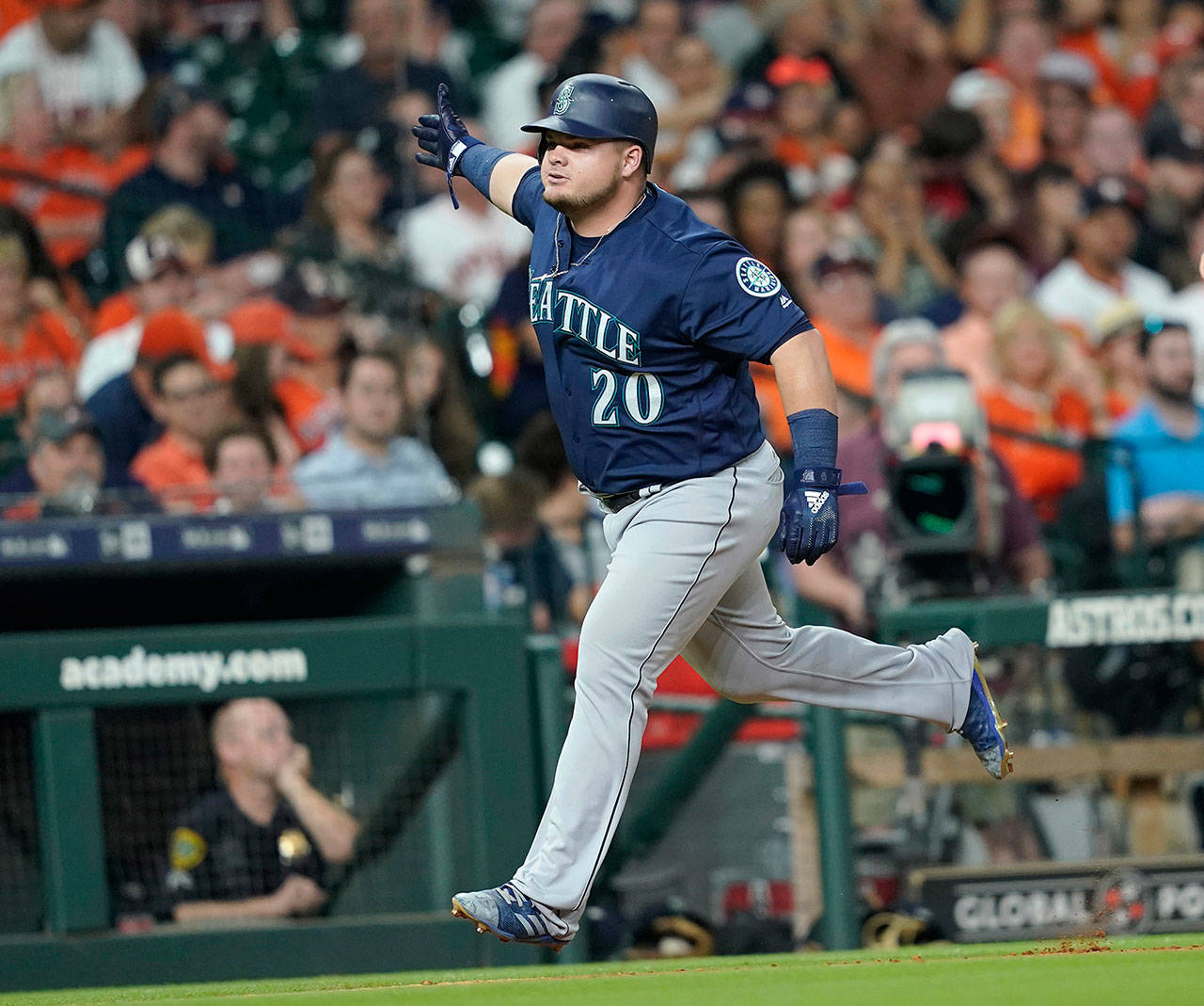 Seattle’s Daniel Vogelbach celebrates after hitting a grand slam against the Houston Astros during the eighth inning of a game on Monday in Houston. (David J. Phillip / Associated Press)