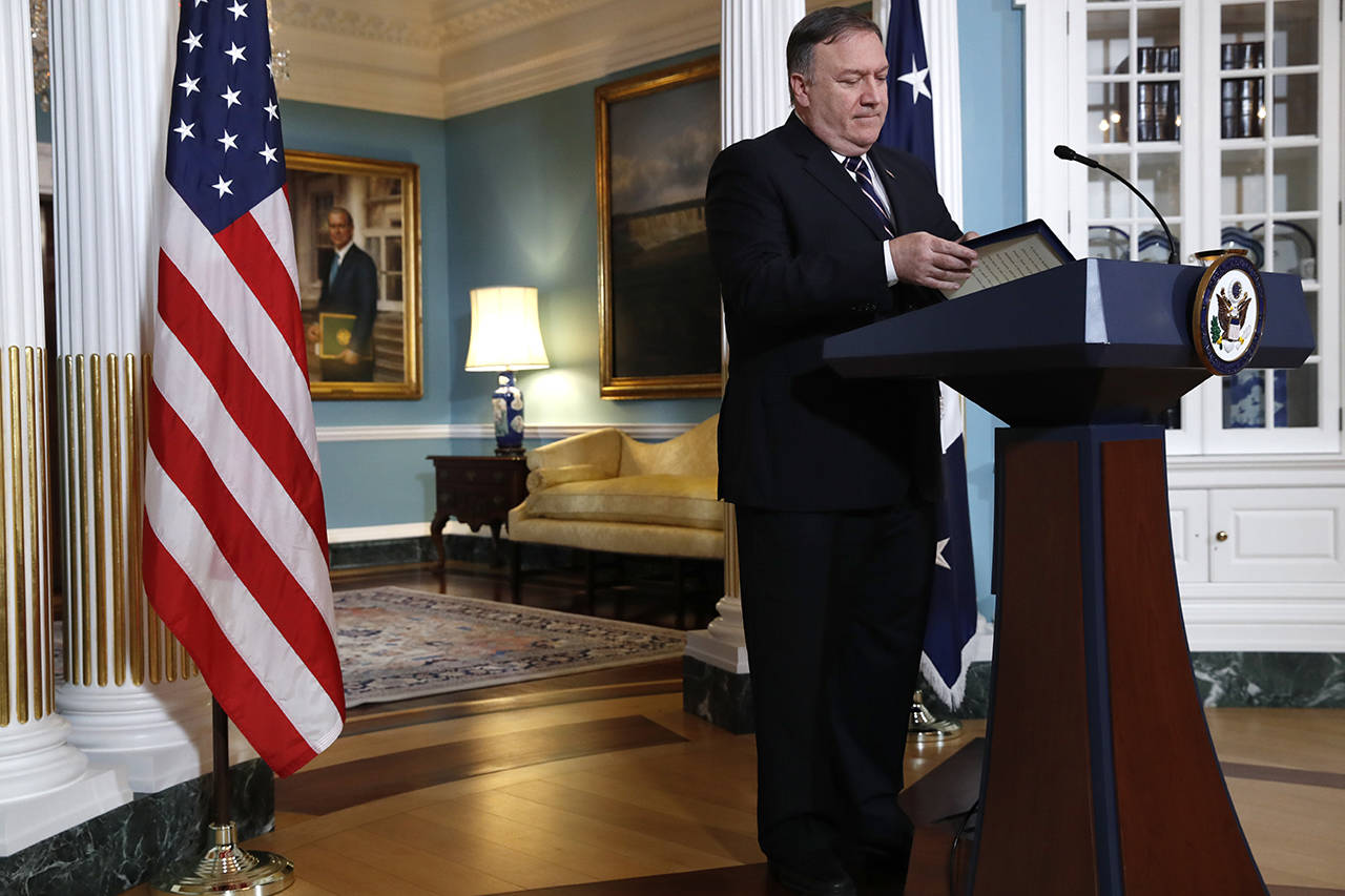 Secretary of State Mike Pompeo finishes speaking about refugees as he makes a statement to the media Monday at the State Department in Washington. (AP Photo/Jacquelyn Martin)
