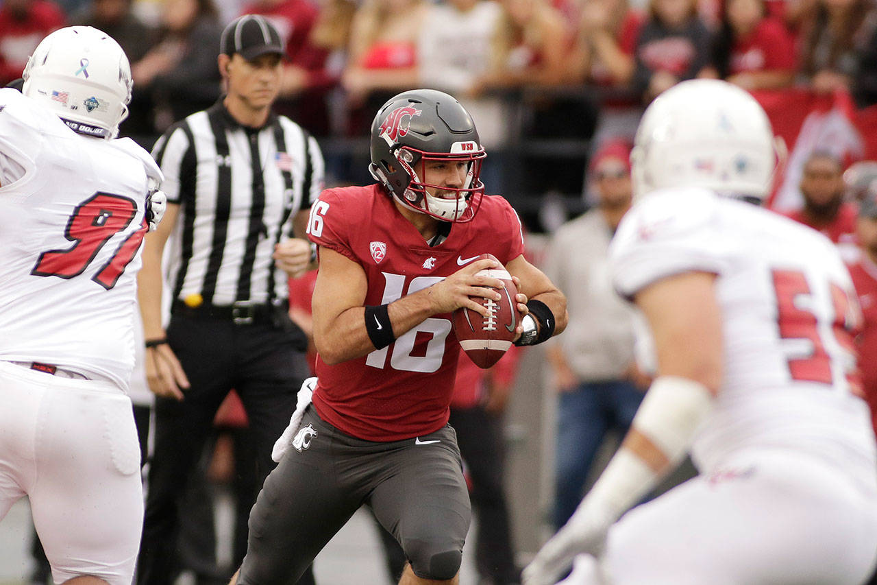 Washington State quarterback Gardner Minshew II (16) runs with the ball during the first half of a game against Eastern Washington on Sept. 15, 2018, in Pullman. (AP Photo/Young Kwak)